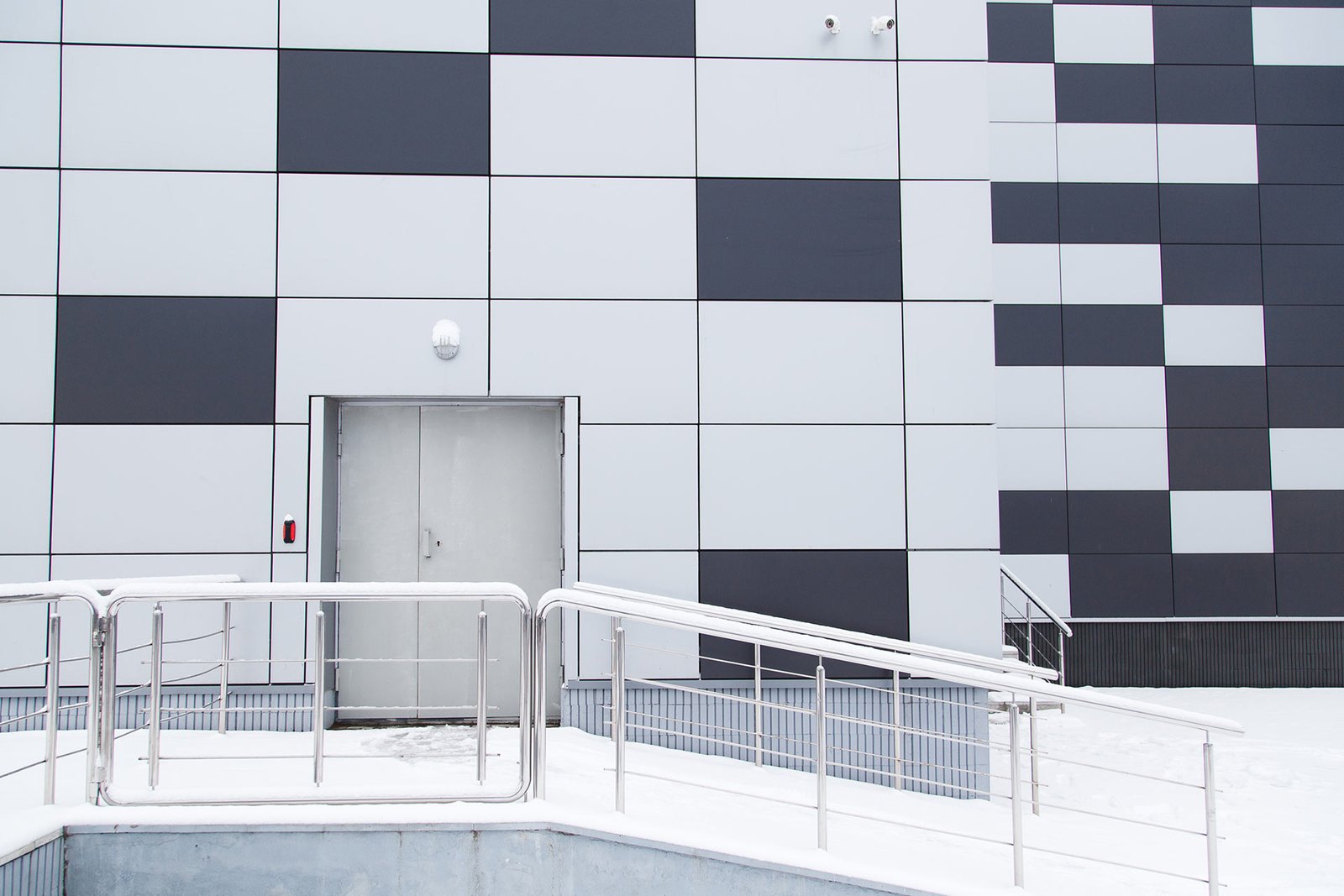 industrial-warehouse-modern-facade-with-door-and-s-2021-08-26-17-11-06-utc-1